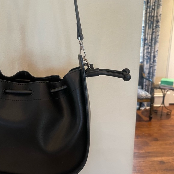 Black leather drawstring Oryany drawstring bucket bag. - Picture 15 of 15